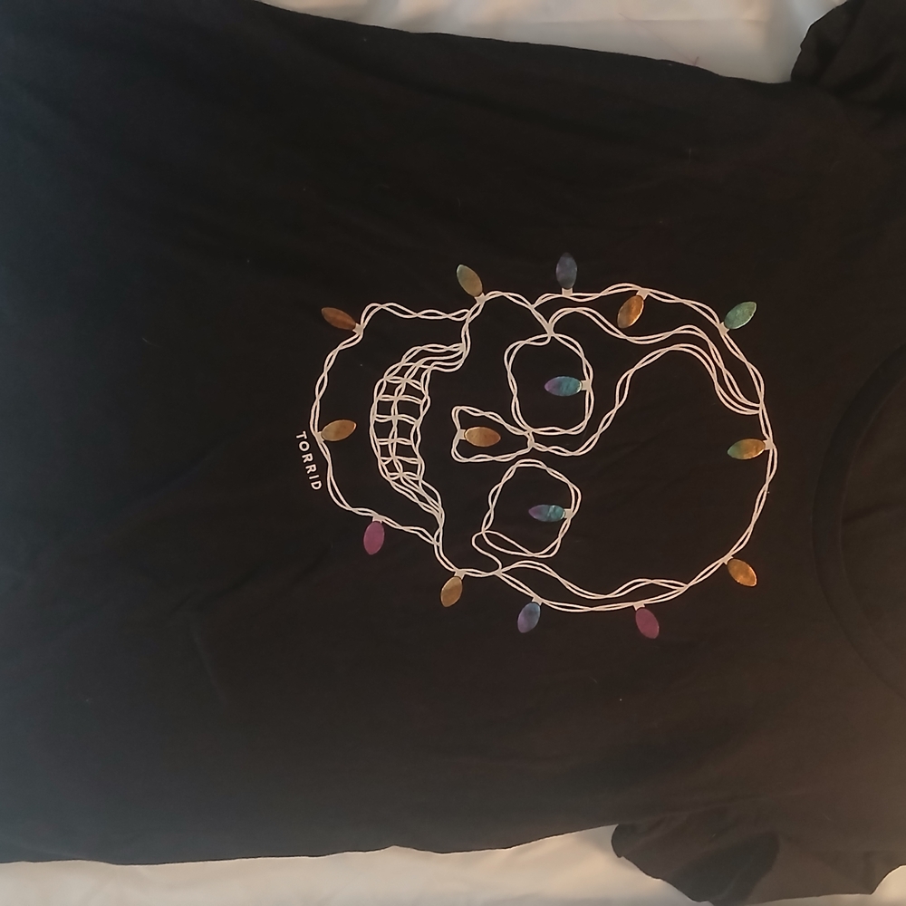 Torrid Black Tee with Festive Skull Design